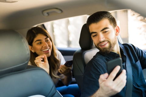 image of a rideshare driver and passenger