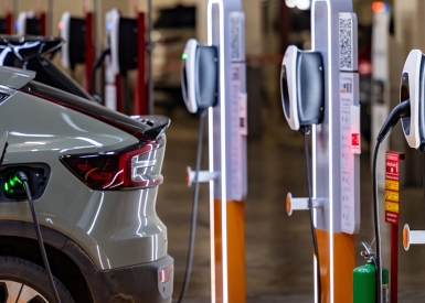 Image of EV fast charger and car charging 